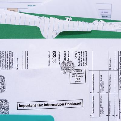 A document folder closed up on a US income tax Form 1099-MISC document.
