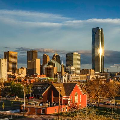 A view of Oklahoma City's skyline during sunset.