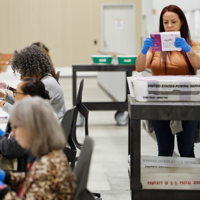 Election workers process ballots at the Los Angeles County Ballot Processing Center in 2025 in City of Industry, California. 