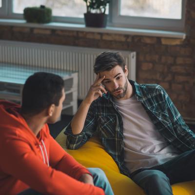 Two young men having a conversation.