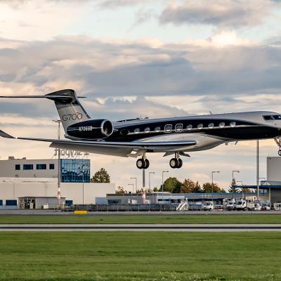 A Gulfstream G700 jet landing at Prague Airport.