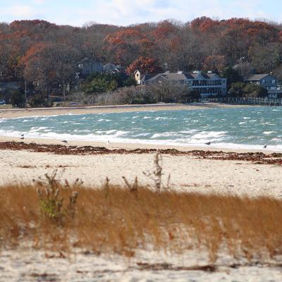 Luxury homes along the Noyac Bay beach in Sag Harbor, New York during winter.