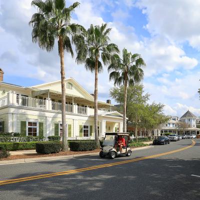 View of a road in The Villages, a popular retirement golf cart-loving community in Florida.