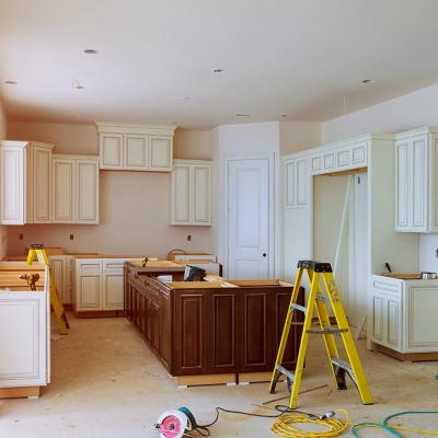 New cabinet installment in progress for a modern kitchen.