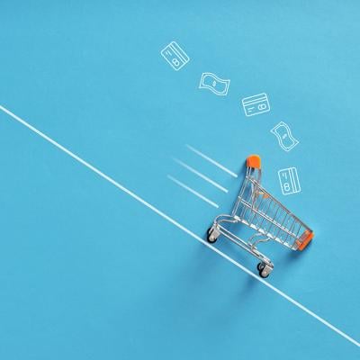 A shopping cart going down a line as a concept of fast shopping checkout.