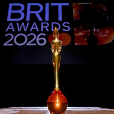 A close up on a BRIT award trophy against a background for the 'BRIT Awards 2026'.