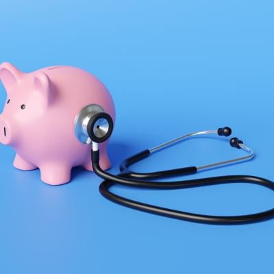 A piggy bank with a stethoscope.