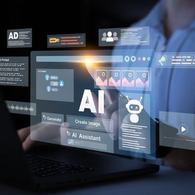 AI assistant software graphics over a person using a laptop.