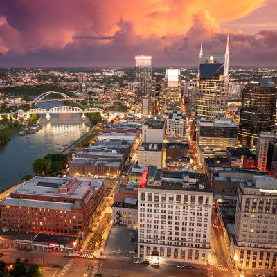 Aerial view of the high-rise buildings and waterfront area by the Cumberland River in Nashville, Tennessee.