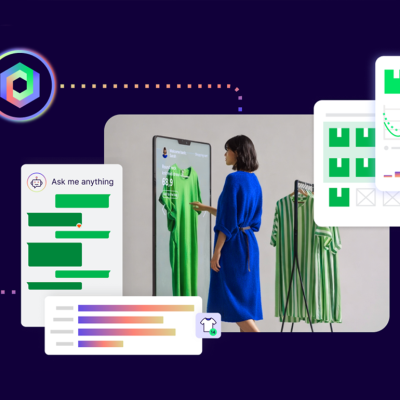 A person looking at a large monitor showing e-commerce data and graphs.