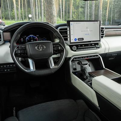 The interior of new modern SUV car with automatic transmission.