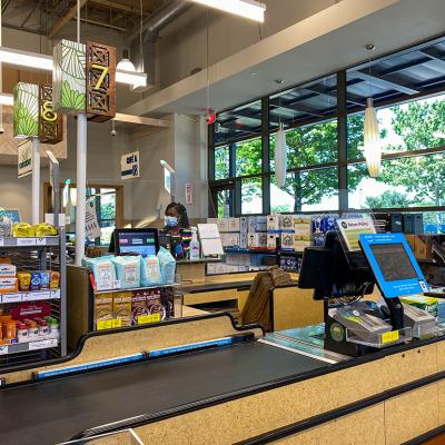 The checkout counter of a Whole Foods grocery store.
