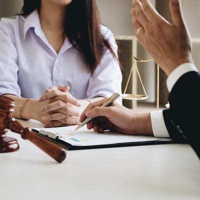 A female entrepreneur consulting with a lawyer.