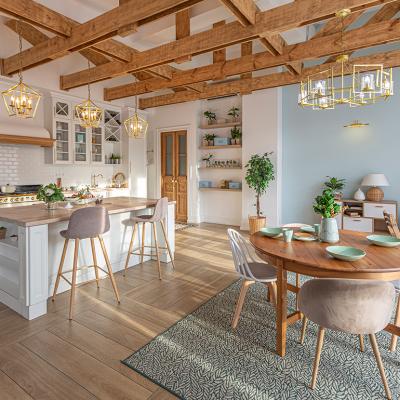 A modern luxury apartment featuring a rich, Scandinavian style interior with wooden motifs.