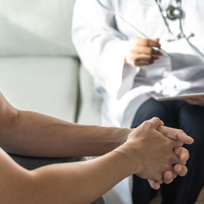 Man consulting with a doctor.