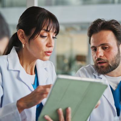 A team of doctors in office for a medical case review.