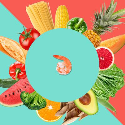 Bread, grains, fruits, and vegetables arranged in a circular pattern around a shrimp at the center. 