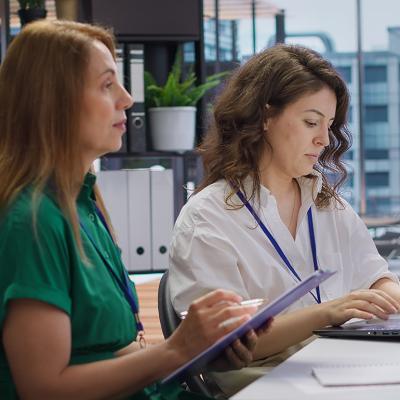 HR employees during an interview with a job applicant in an office.