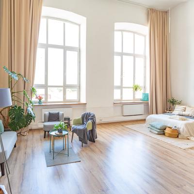 A spacious apartment with a Scandinavian style interior.