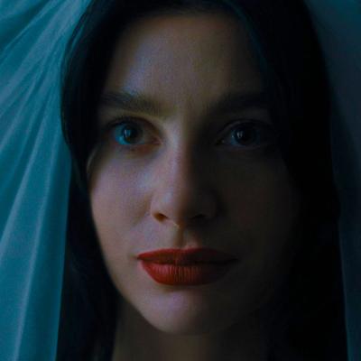 Close up of Camila Morrone as Rachel on Something Bad is Going to Happen