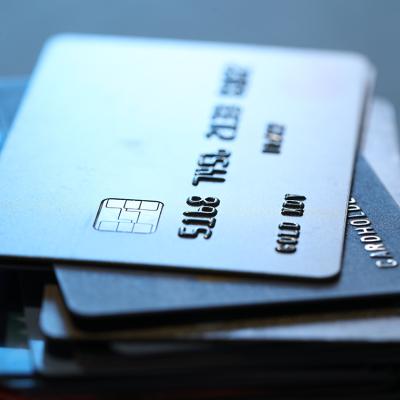 A stack of grey credit cards.