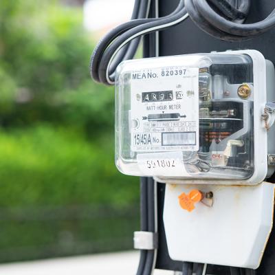 An electric meter measuring power for energy costs.