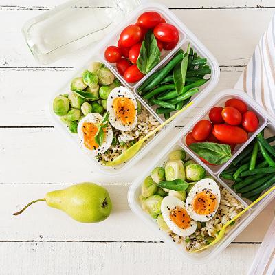 Vegetarian meals with eggs in containers.