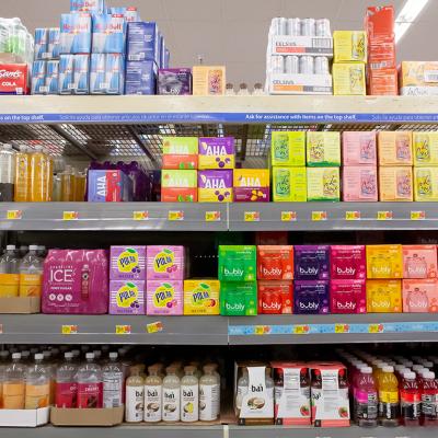 A view of several shelves of sparkling water.