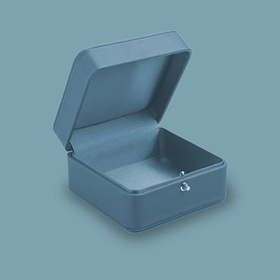 An empty teal jewelry box.
