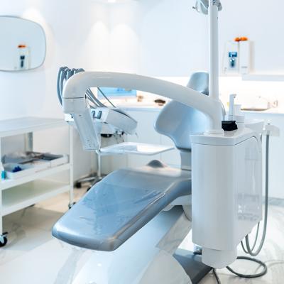 An empty dental patient's chair in a modern dental clinic.