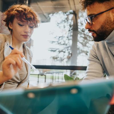 A diverse business team engaged in a discussion.