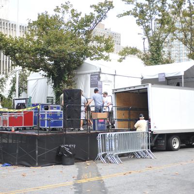  Workers build a backstage entrance at tents during a New York Fashion Week event.