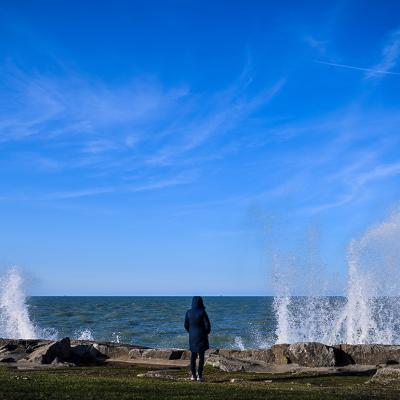 Zsofia Trasy at the Lake Michigan crash against the Promontory Point's shoreline in Chicago, Illinois, USA.