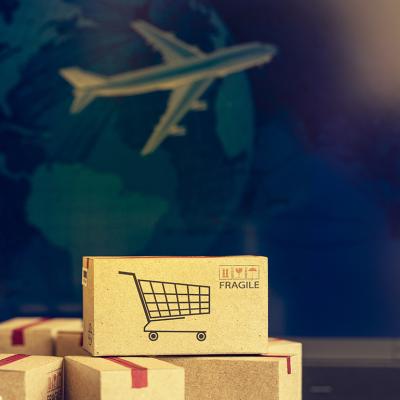 Fragile boxes with a background of air cargo as a concept of international shipping.