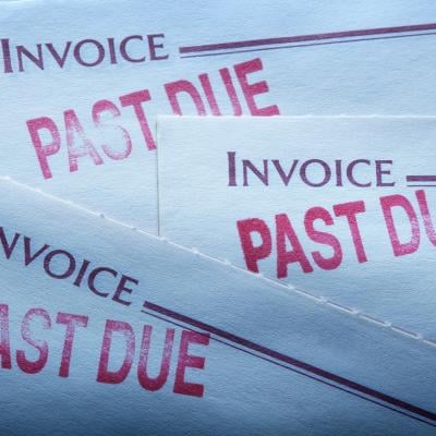 Invoice statements with past due markings indicating overdue payments.