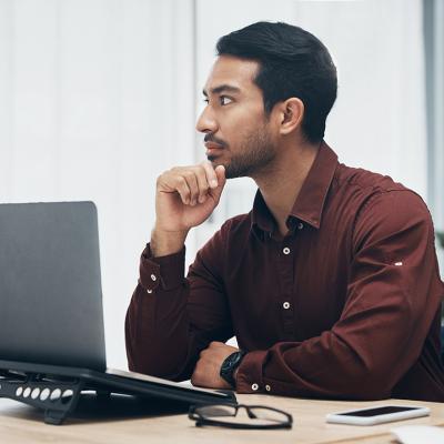 A business employee planning on solutions for a work project in an office.l
