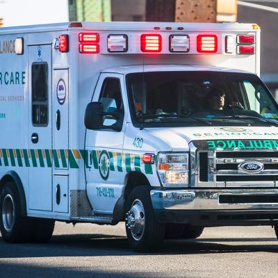 A senior care ambulance from a road in New York City, USA.
