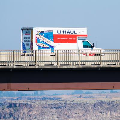 A U-Haul moving truck traveling on Perrine Memorial Bridge in Idaho.
