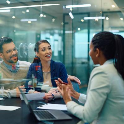 A couple having a consultation with a finance professional.