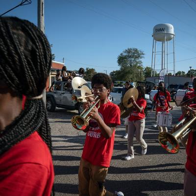 Students in the West Bolivar High School marching band take part in the McEvans School homecoming parade in Shaw, Mississippi on September 23, 2022.