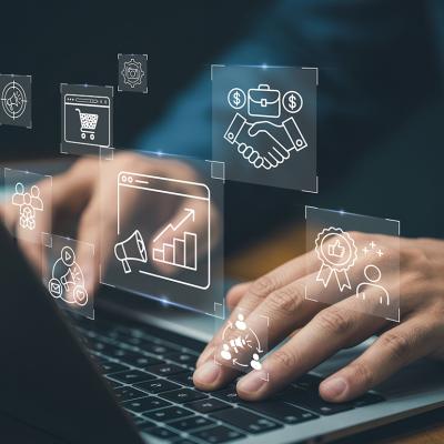 Businessman navigating a system illustrated with virtual marketing automation graphics.