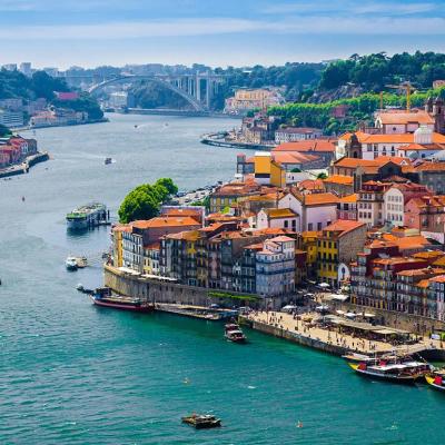 A scenic view of Porto, Portugal along the Douro River.