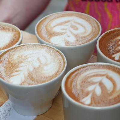 Cups of latte on a tray.