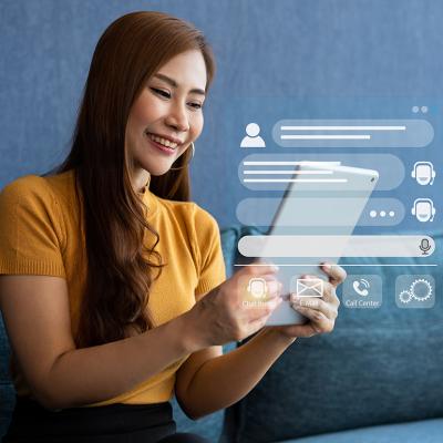 A young woman interacting with customer service illustrated with agentic AI software graphics.