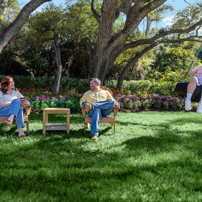 A family enjoying their time in the house yard.