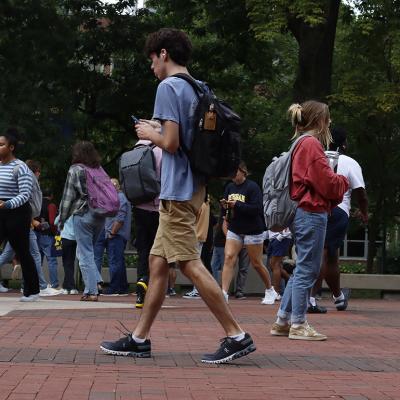 Students walking to their classes in a university town in Ann Arbor, Michigan, USA.