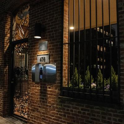 An exterior of a doorway in a city neighborhood in New York, USA.