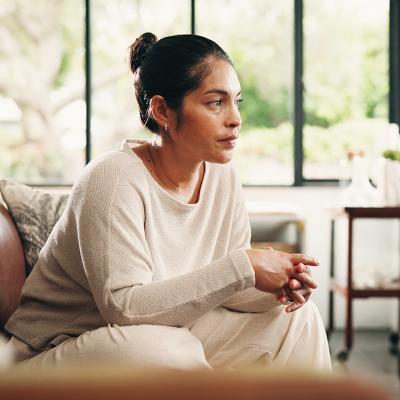 A person taking her time for calm contemplation and reflection at home.