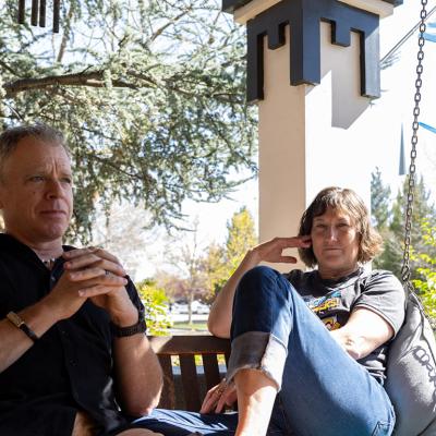 Michael and Dr. Angie Devitt taking their time for some reflection at a balcony.