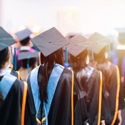 University graduating students lined up during commencement day.